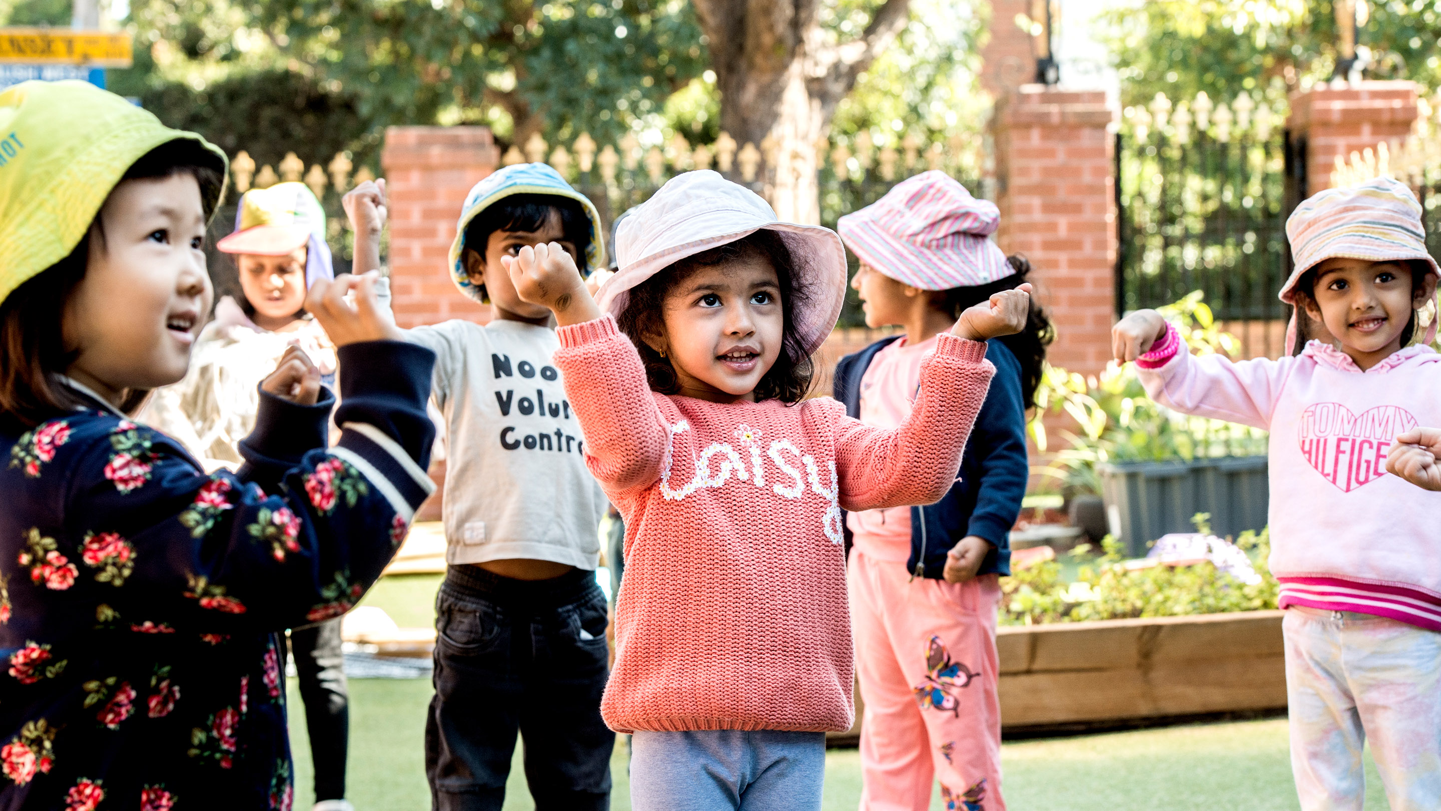 Children at an early learning service playing outside.